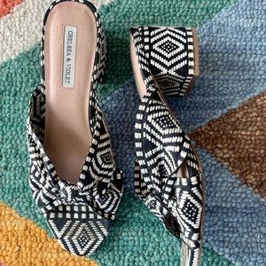 CHELSEA & VIOLET BLACK AND WHITE PATTERN FABRIC HEELED MULES SZ 9